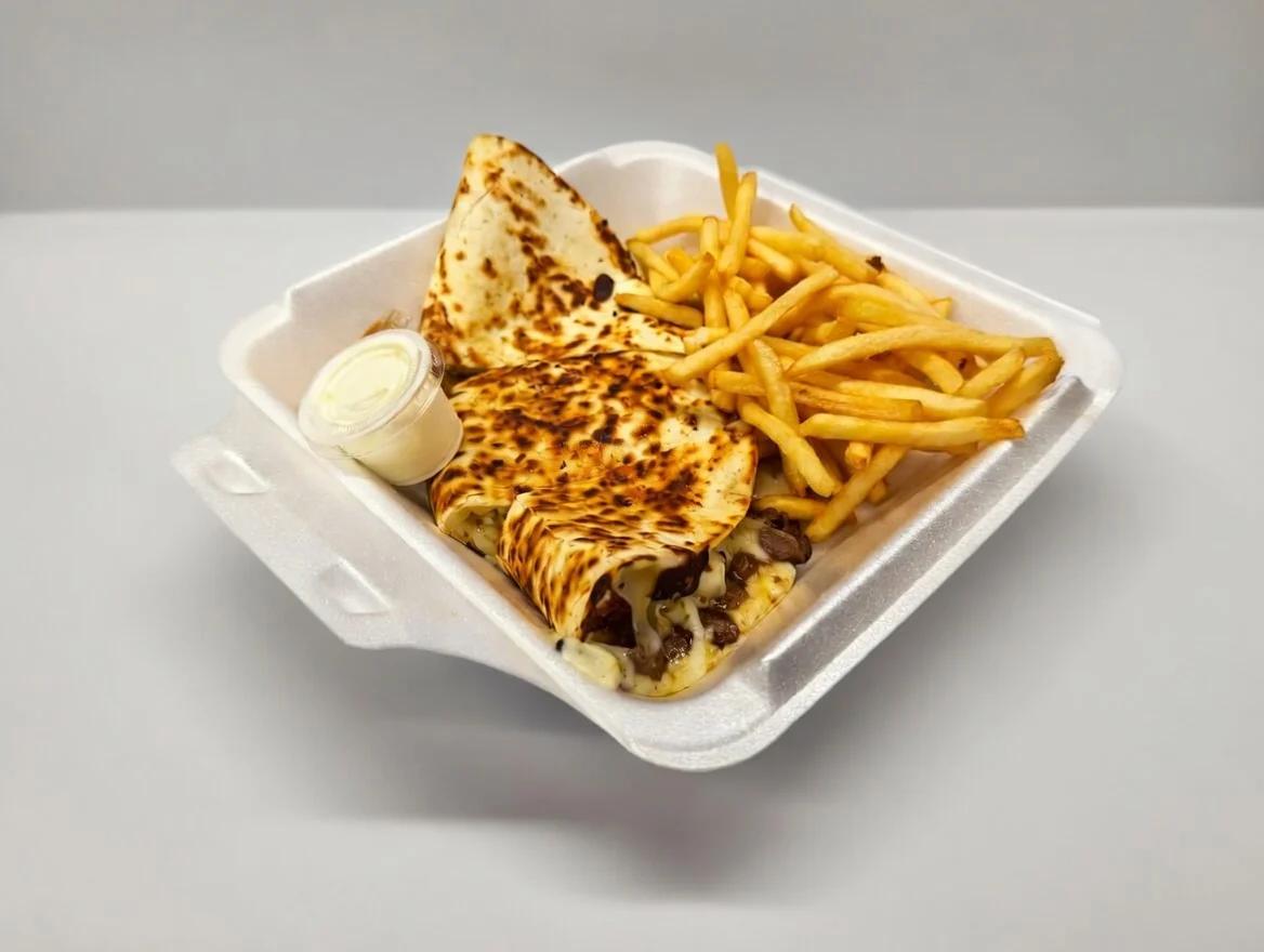 Loaded cheese quesadilla grilled crispy — the cheesiest quesadilla in South Florida