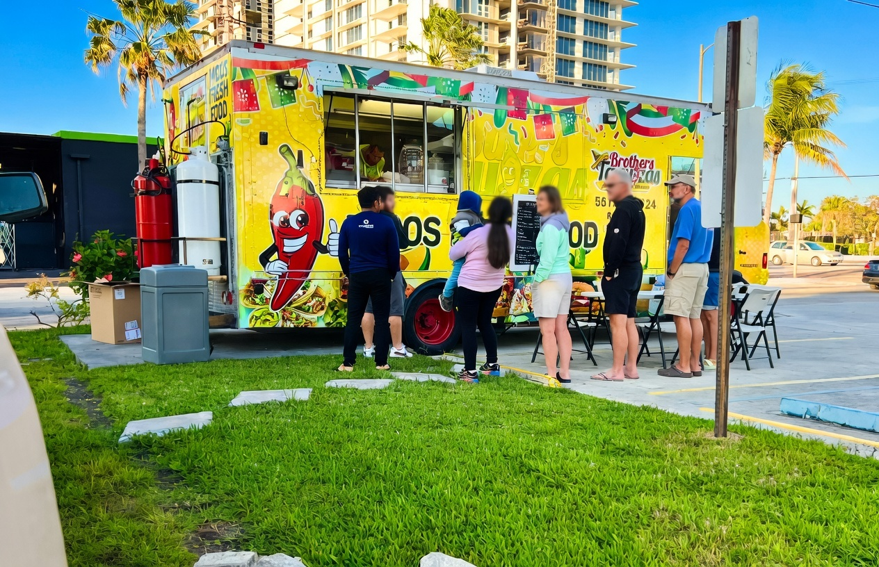 Brothers Taquizas authentic Mexican food truck parked at 3707 Broadway in Riviera Beach, Florida